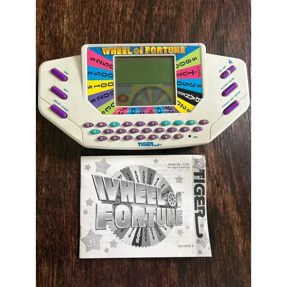 1995 Tiger Electronics Wheel Of Fortune Handheld LCD Video Game Plus Cartridge 1